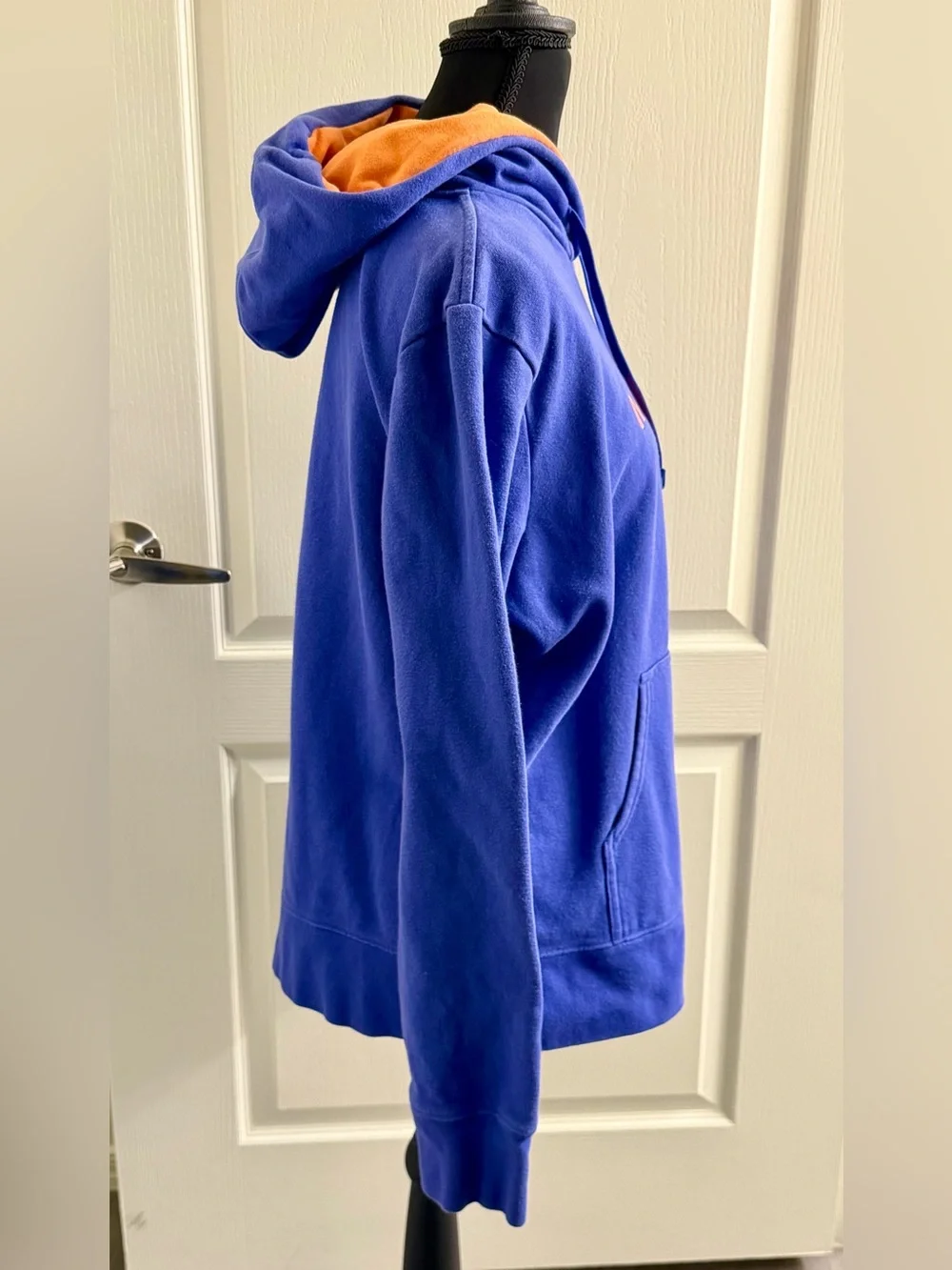 The North Face Women’s Blue Hoodie with Orange Logo
